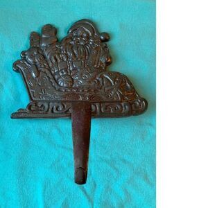 Cast Iron Santa hook‎ for fireplace or mantle